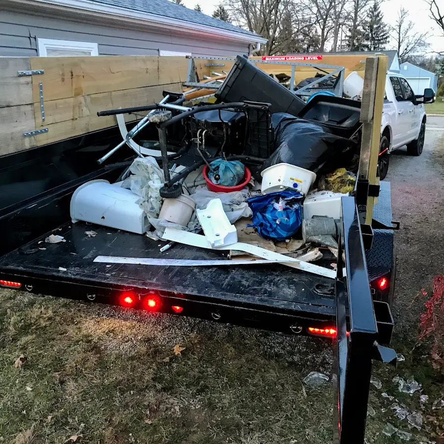 Roll-off dumpster delivered to a residential driveway in Saline